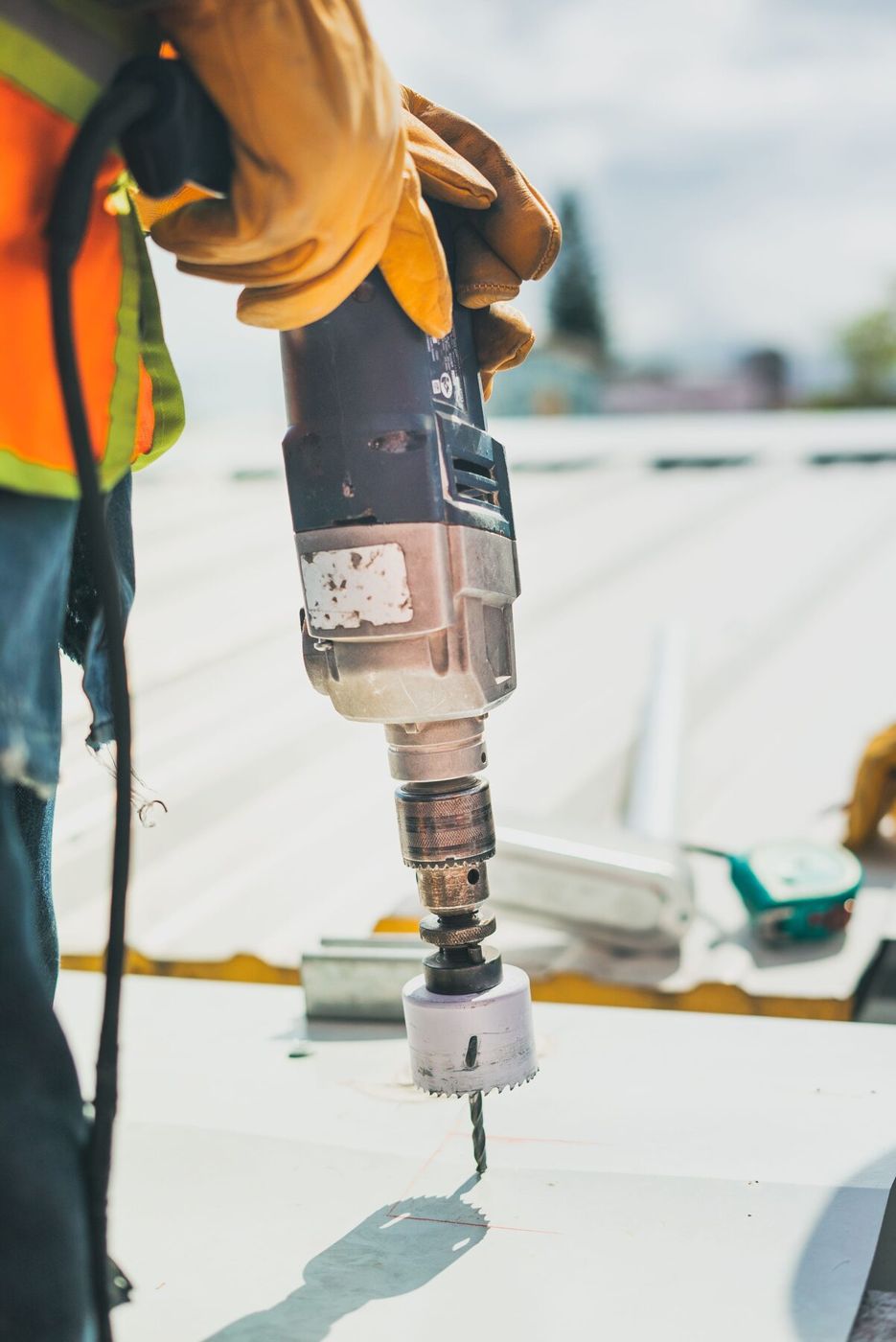 Contractor inspecting a commercial roof